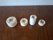 4 alte Porzellan - Gewichte